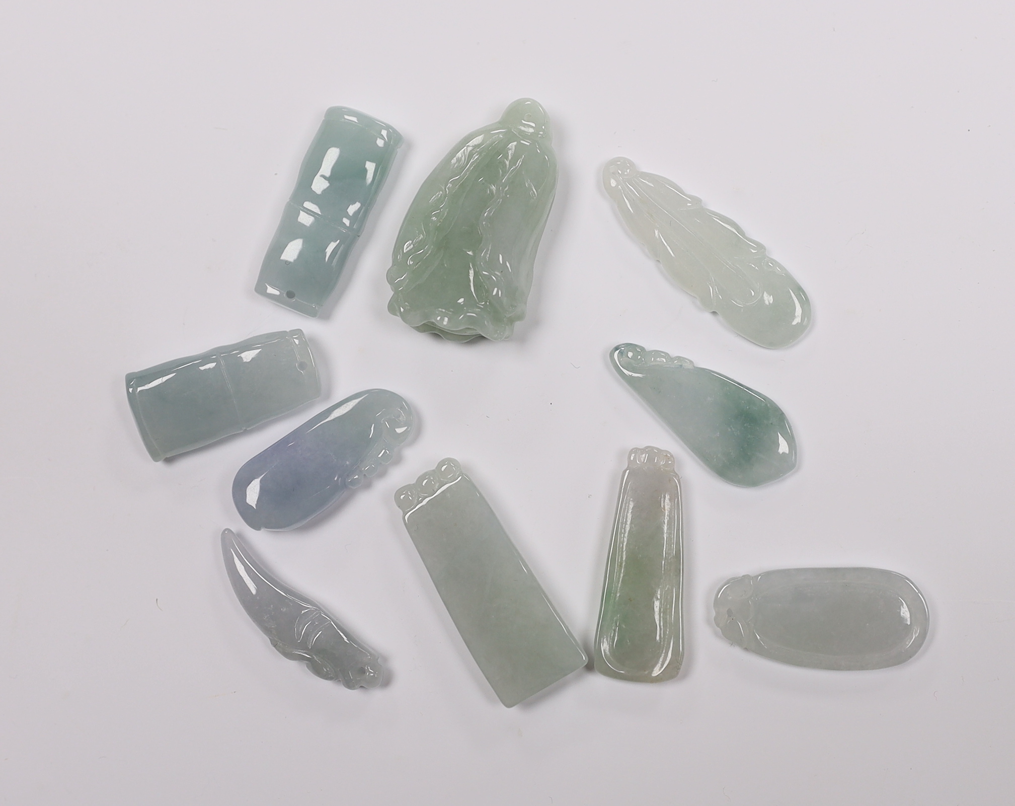 Ten various Chinese jadeite carved pendants